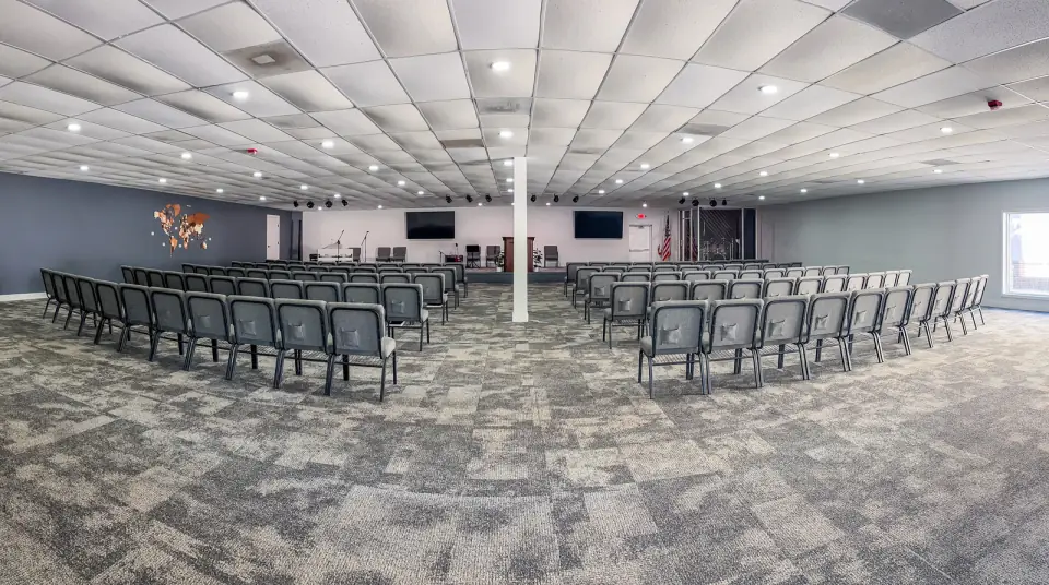 The Sacred Farewells sanctuary in Davie, rows of chairs facing the stage